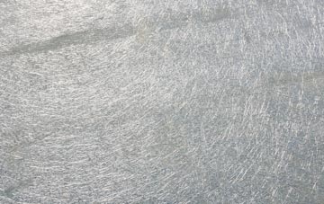 Scorrier laminate fibreglass or shingles?