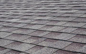 Scorrier tiles for shallow pitch roofing